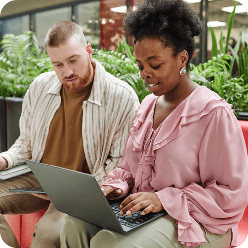 Two colleagues compairing notes